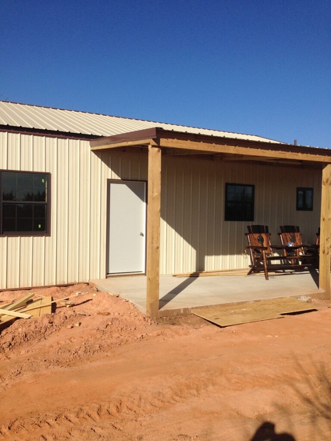 Back porch - Barndominium construction by Texstone Homes