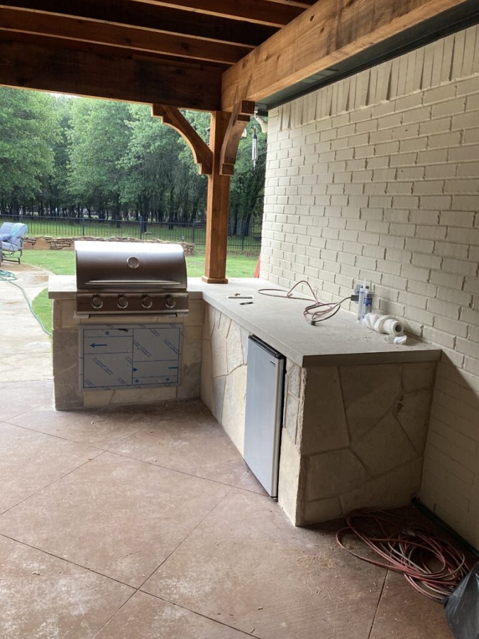 Outdoor kitchen by Texstone Homes